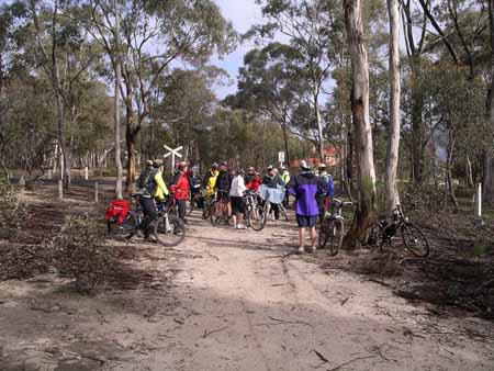 Group of cyclists gathered on the O'Keefe Rail Trail