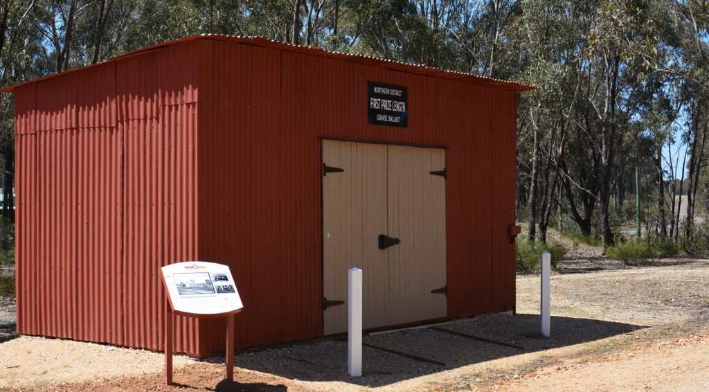 Photo: Rifle Butts siding Gang Shed, with new interpretive sign